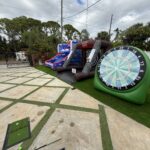 Guests enjoying interactive lawn games at a Tampa Bay event