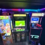 Premier GameVerse Mobile Arcade trailer featuring arcade games, PlayStation, Xbox, and Nintendo gaming stations
