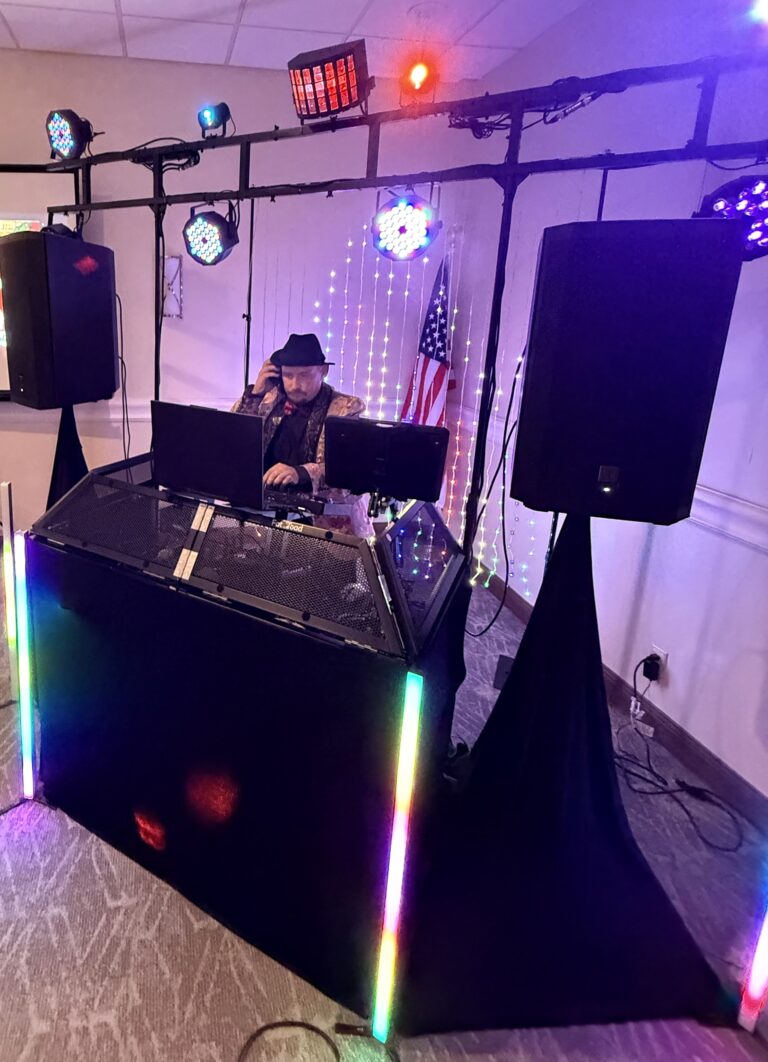 DJ Services DJ Mike performing at a live event with Premier DJ Services